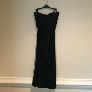 Black sleeveless jumpsuit with waist tie
